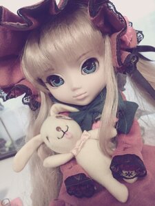 Rating: Safe Score: 0 Tags: 1girl blonde_hair blue_eyes bow doll dress holding_stuffed_toy long_hair long_sleeves looking_at_viewer shinku solo stuffed_animal stuffed_bunny teddy_bear upper_body User: admin