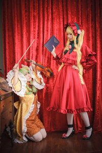 Rating: Safe Score: 0 Tags: 2girls blonde_hair bonnet book bow curtains dress frills hat long_hair multiple_cosplay multiple_girls shinku tagme weapon User: admin