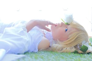 Rating: Safe Score: 0 Tags: 1girl blonde_hair blue_eyes bug butterfly crown grass insect kirakishou lips lying solo striped vertical_stripes User: admin
