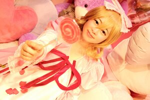 Rating: Safe Score: 0 Tags: 1girl blonde_hair candy dress food hair_ribbon hinaichigo lips lollipop long_hair ribbon solo swirl_lollipop User: admin