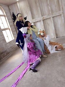 Rating: Safe Score: 0 Tags: blonde_hair dress feathers hair_ornament hat long_hair multiple_cosplay multiple_girls sitting tagme thighhighs very_long_hair weapon white_hair User: admin