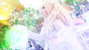 Rating: Safe Score: 0 Tags: 1girl blonde_hair blurry depth_of_field dress flower kirakishou long_hair long_sleeves solo striped striped_dress vertical_stripes User: admin