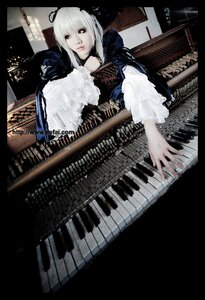 Rating: Safe Score: 0 Tags: 1girl 3d dress instrument long_hair nail_polish solo suigintou white_hair User: admin