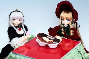 Rating: Safe Score: 0 Tags: 2girls blonde_hair blue_eyes bonnet cup doll dress flower frills long_hair long_sleeves multiple_dolls multiple_girls rose shinku silver_hair sitting suigintou table tagme teacup wings User: admin