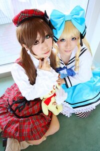 Rating: Safe Score: 0 Tags: 2girls blonde_hair blue_eyes blurry bow brown_hair depth_of_field dress hair_bow hat lips long_hair looking_at_viewer multiple_cosplay multiple_girls photo plaid skirt smile tagme User: admin