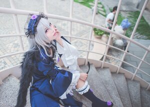 Rating: Safe Score: 0 Tags: 1girl black_legwear blurry depth_of_field dress frills kneehighs lolita_fashion long_hair sitting solo suigintou User: admin