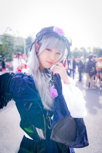 Rating: Safe Score: 0 Tags: 1girl bag bangs blunt_bangs blurry blurry_background closed_mouth depth_of_field flower hair_flower hair_ornament lips long_hair looking_at_viewer outdoors purple_eyes solo suigintou User: admin