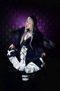 Rating: Safe Score: 0 Tags: 1girl closed_eyes cross dress holding long_hair long_sleeves necklace solo suigintou weapon white_hair User: admin