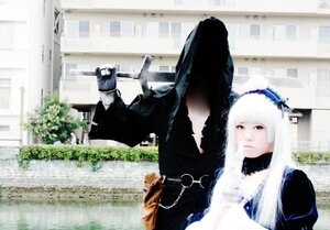 Rating: Safe Score: 0 Tags: 1girl auto_tagged building chain city day dress long_hair outdoors solo suigintou white_hair User: admin