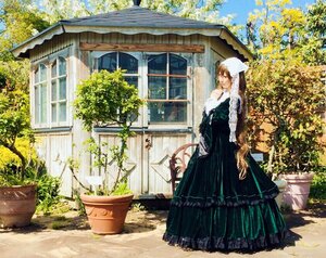 Rating: Safe Score: 0 Tags: 1girl building cat day dress flower long_hair outdoors solo standing suiseiseki traditional_media tree User: admin