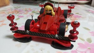 Rating: Safe Score: 0 Tags: 1girl blonde_hair blue_eyes doll dress ground_vehicle hat motor_vehicle red_dress shinku solo User: admin