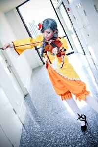 Rating: Safe Score: 0 Tags: 1girl auto_tagged blurry blurry_background bow_(instrument) depth_of_field frills hair_ornament instrument kanaria music photo playing_instrument solo standing violin User: admin