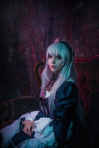 Rating: Safe Score: 0 Tags: 1girl closed_mouth dress frills gothic_lolita hairband lips long_hair long_sleeves red_eyes solo suigintou wide_sleeves User: admin