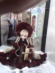 Rating: Safe Score: 0 Tags: 1girl blonde_hair doll dress frills long_hair photo red_dress shinku sitting solo stuffed_animal User: admin