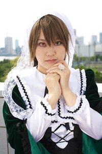 Rating: Safe Score: 0 Tags: 1girl blurry brown_hair building closed_mouth depth_of_field dress hands_clasped hands_together heterochromia interlocked_fingers lips long_sleeves looking_at_viewer own_hands_together realistic red_eyes short_hair solo striped suiseiseki User: admin