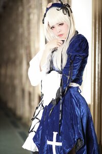 Rating: Safe Score: 0 Tags: 1girl bangs blue_dress blurry blurry_background depth_of_field dress hairband long_hair long_sleeves looking_at_viewer red_eyes ribbon solo standing suigintou white_hair User: admin