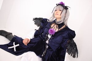 Rating: Safe Score: 0 Tags: 1girl black_wings feathers flower gothic_lolita long_hair purple_eyes rose silver_hair solo suigintou wings User: admin