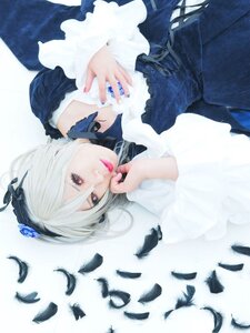 Rating: Safe Score: 0 Tags: 1girl bird black_feathers choker crow dove dress feathers flower gothic_lolita hairband lips long_sleeves nail_polish red_eyes ribbon rose short_hair solo suigintou white_feathers User: admin