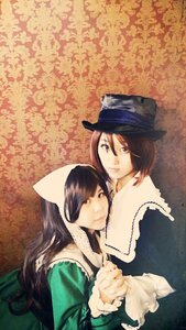 Rating: Safe Score: 0 Tags: 2girls 91076 black_hair brown_hair dress green_dress hat long_hair long_sleeves multiple_cosplay multiple_girls short_hair suiseiseki tagme top_hat User: admin