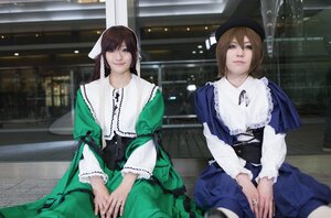 Rating: Safe Score: 0 Tags: 2girls blue_dress blue_eyes brown_hair capelet dress green_dress hat jewelry long_sleeves looking_at_viewer multiple_cosplay multiple_girls ribbon ring siblings sisters sitting smile tagme User: admin