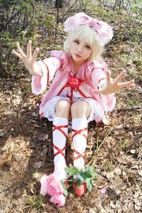 Rating: Safe Score: 0 Tags: 1girl blonde_hair bloomers dress flower hat hinaichigo kneehighs leaf lips outstretched_hand plant ribbon short_hair sitting solo traditional_media User: admin