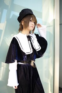 Rating: Safe Score: 0 Tags: 1girl blue_eyes brown_hair capelet dress earrings hat jewelry lips long_sleeves profile short_hair solo souseiseki standing User: admin