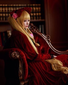 Rating: Safe Score: 0 Tags: 1girl blonde_hair blurry bonnet curtains dress flower hat hat_flower lips long_hair realistic red_dress rose shinku sitting solo User: admin