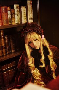 Rating: Safe Score: 0 Tags: 1girl blonde_hair bookshelf dress indoors long_hair long_sleeves looking_at_viewer red_dress shinku sitting solo User: admin