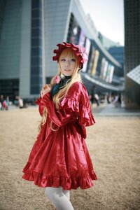 Rating: Safe Score: 0 Tags: 1girl blonde_hair blue_eyes blurry blurry_background bonnet building depth_of_field dress drill_hair figure frills long_hair outdoors pantyhose photo photo_background red_dress shinku solo standing User: admin
