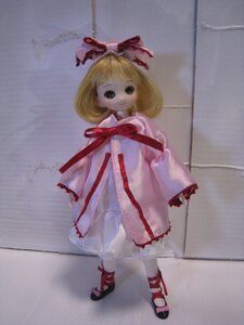 Rating: Safe Score: 0 Tags: 1girl blonde_hair bow doll dress hinaichigo looking_at_viewer photo red_footwear ribbon shoes short_hair smile solo standing User: admin