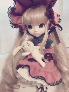 Rating: Safe Score: 0 Tags: 1girl blonde_hair blue_eyes bow doll dress frills hair_ribbon long_hair long_sleeves looking_at_viewer red_dress ribbon shinku sitting solo stuffed_animal User: admin