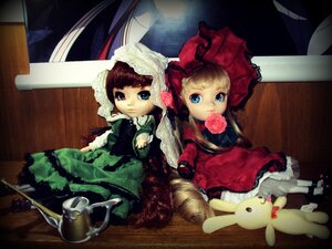 Rating: Safe Score: 0 Tags: 2girls blonde_hair blue_eyes bonnet bow doll dress flower hat multiple_dolls multiple_girls pink_bow red_dress rose shinku sitting stuffed_animal tagme teacup User: admin