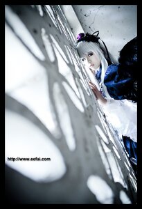 Rating: Safe Score: 0 Tags: 1girl black_border blurry depth_of_field dress flower frills letterboxed lips long_hair long_sleeves ribbon silver_hair snow solo suigintou wings winter User: admin