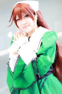 Rating: Safe Score: 0 Tags: 1girl heterochromia interlocked_fingers lips long_hair long_sleeves looking_at_viewer ponytail red_eyes ribbon smile solo suiseiseki User: admin