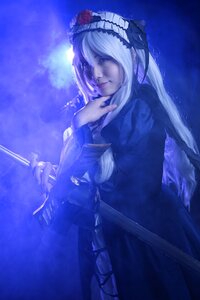 Rating: Safe Score: 0 Tags: 1girl blue_background blue_theme dress flower frills gothic_lolita hairband lolita_fashion long_hair long_sleeves rose silver_hair solo suigintou User: admin