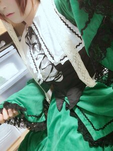 Rating: Safe Score: 0 Tags: 1girl blonde_hair dress frills green_dress head_out_of_frame long_sleeves ribbon solo suiseiseki traditional_media User: admin