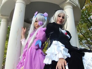 Rating: Safe Score: 0 Tags: 2girls black_dress blonde_hair dress dual_persona eyepatch flower hair_ornament long_hair long_sleeves multiple_cosplay multiple_girls photo tagme weapon User: admin