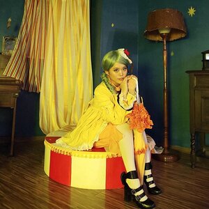 Rating: Safe Score: 0 Tags: 1girl box breasts curtains flower green_hair hair_ornament indoors kanaria sitting solo window User: admin