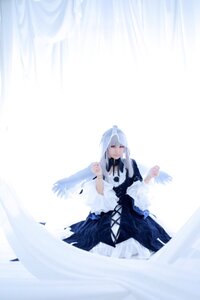 Rating: Safe Score: 0 Tags: 1girl bangs closed_mouth dress long_hair long_sleeves shirt solo striped suigintou vertical_stripes User: admin
