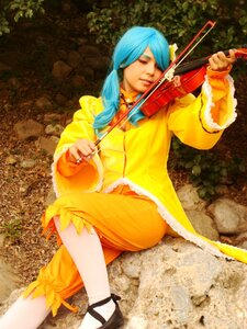 Rating: Safe Score: 0 Tags: 1girl blue_hair closed_eyes hair_over_shoulder instrument kanaria long_hair music playing_instrument sitting solo twintails violin User: admin