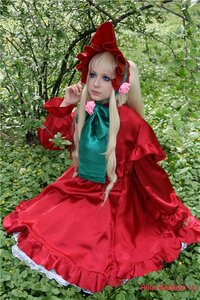 Rating: Safe Score: 0 Tags: 1girl blonde_hair blue_eyes bonnet bow bush capelet dress flower forest frills long_hair nature outdoors plant red_dress shinku sitting solo tree User: admin