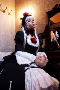 Rating: Safe Score: 0 Tags: 1girl black_dress dress fine_art_parody hands_clasped hat lips own_hands_together realistic silver_hair solo suigintou User: admin
