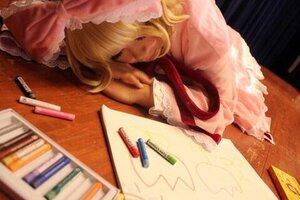 Rating: Safe Score: 0 Tags: 1girl alice_margatroid blonde_hair blurry book closed_eyes depth_of_field flandre_scarlet frills hat hinaichigo indoors lying ribbon sleeping solo User: admin