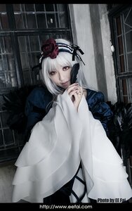 Rating: Safe Score: 0 Tags: 1girl flower hair_flower hair_ornament looking_at_viewer nail_polish red_eyes solo suigintou watermark white_hair User: admin