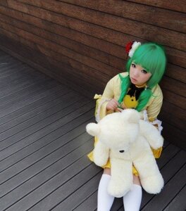 Rating: Safe Score: 0 Tags: 1girl animal bangs dress flower green_hair hair_flower hair_ornament holding kanaria long_sleeves solo standing yellow_dress User: admin