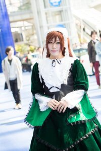 Rating: Safe Score: 0 Tags: 1girl 3d blurry blurry_background blurry_foreground brown_hair building depth_of_field dress green_dress long_sleeves looking_at_viewer outdoors pants photo shirt smile solo solo_focus standing suiseiseki User: admin