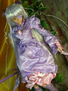 Rating: Safe Score: 0 Tags: 1girl barasuishou dress frills image long_hair long_sleeves solo sword weapon yellow_eyes User: admin