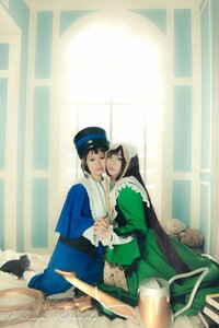 Rating: Safe Score: 0 Tags: 2girls black_hair blonde_hair dress green_dress hat holding_hands indoors long_hair multiple_cosplay multiple_girls sitting stuffed_animal tagme teddy_bear top_hat window User: admin