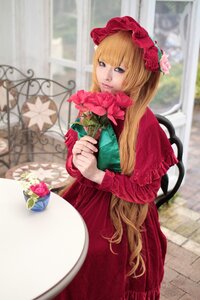 Rating: Safe Score: 0 Tags: 1girl bangs basket blonde_hair blurry bonnet depth_of_field dress flower long_hair long_sleeves red_dress rose shinku solo very_long_hair User: admin