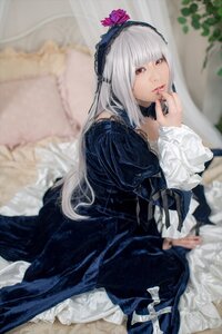 Rating: Safe Score: 0 Tags: 1girl bangs blurry blurry_background blurry_foreground depth_of_field dress flower frills gothic_lolita hairband lips lolita_fashion long_hair long_sleeves looking_at_viewer photo red_eyes rose sitting solo suigintou User: admin
